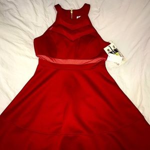 Short red halter top dress with mesh cutouts
